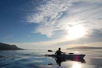 kayaker on calm water