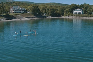 Group of stand up paddleboarders in Bar Harbor