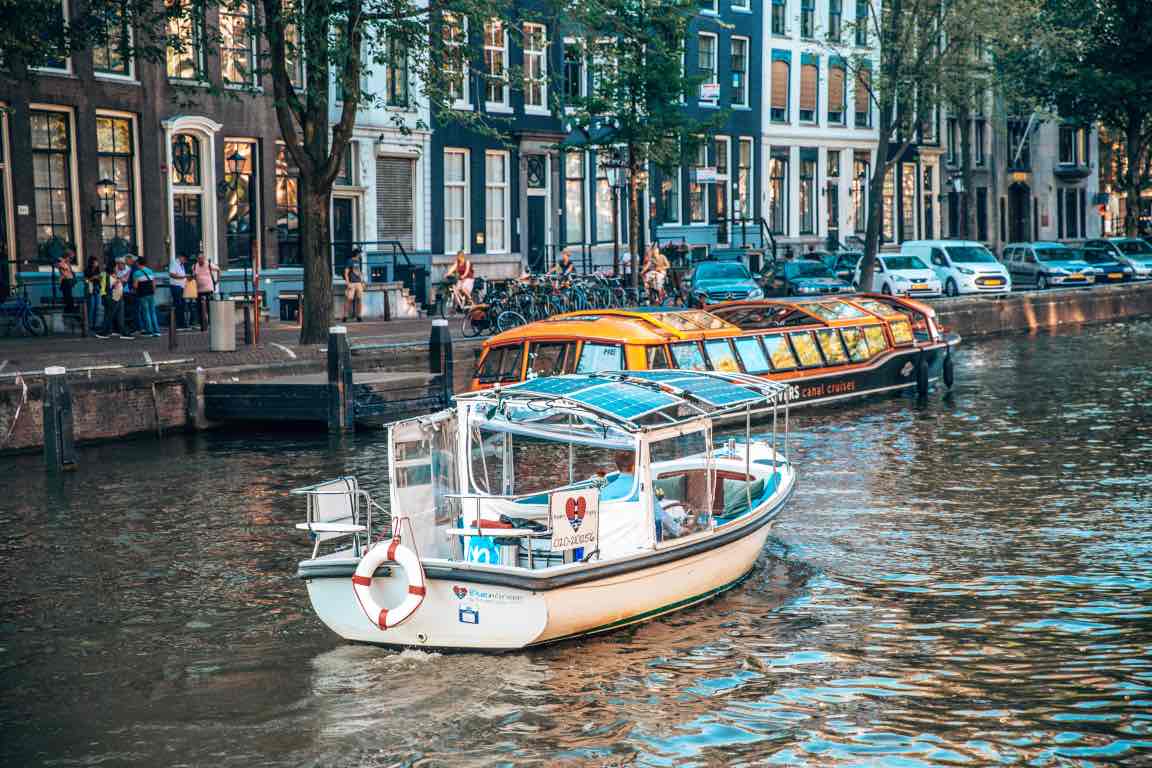 small boat on the canal amsterdam romantic