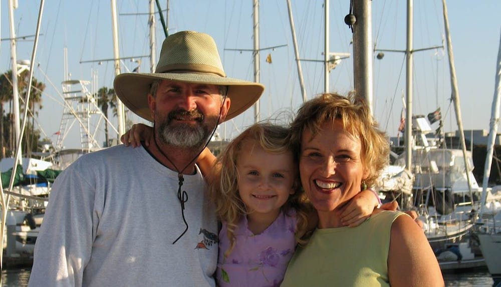 Captain Dave, wife Gisele, and their daughter