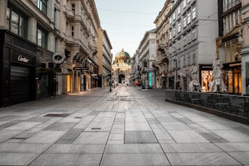a street scene with focus on the sidewalk