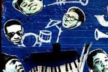 Jazz artists on a blue wall along with instruments