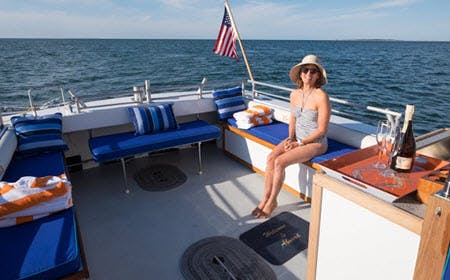 Lady Enjoying Cape Cod Boating Adventure