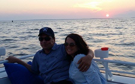 Couple Enjoying Private Sunset On A Cruise