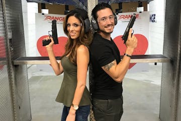 couple at a shooting range together