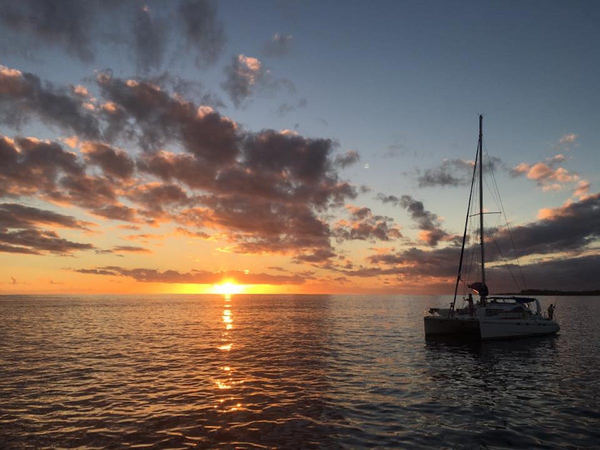 L'Escapade Charter Tahiti boat at sunset