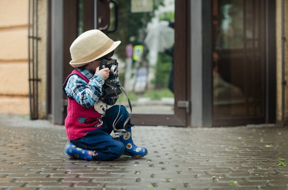 Toddler with camera