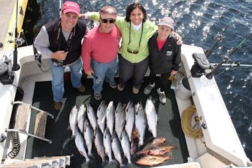 A boat full of caught salmon on a Ketchikan Charter Boat