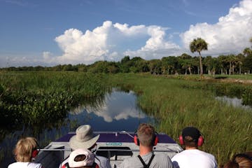 a group of people on an airboat