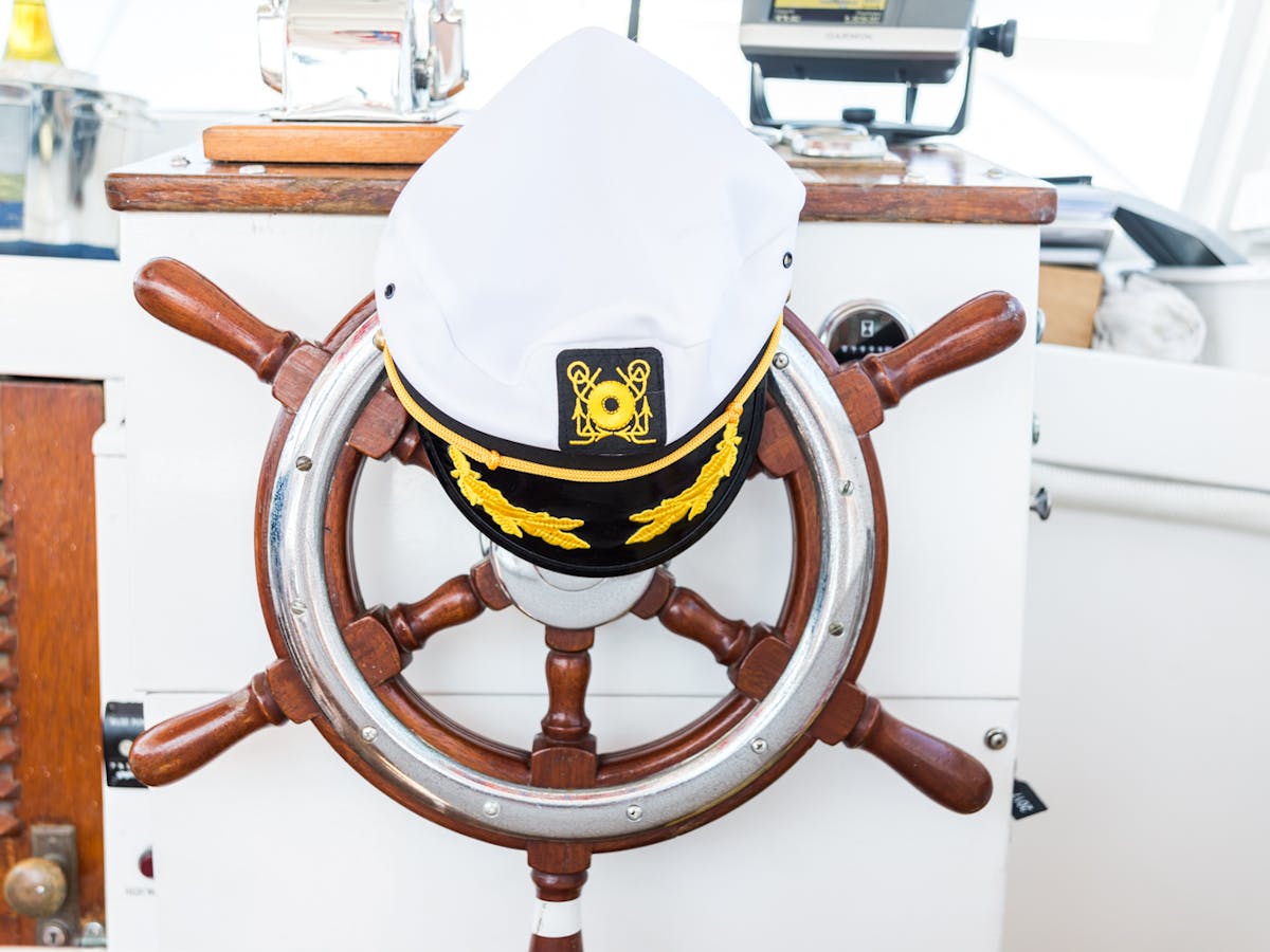 Ships wheel and captains hat on luxury yacht in Huntington Beach CA