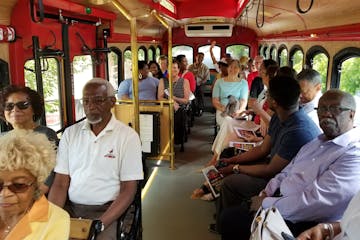 People riding on trolley