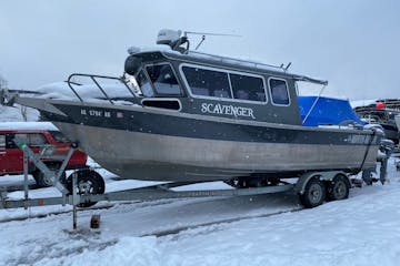 a boat sitting in the snow
