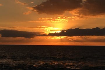 A bright orange sunset over the ocean