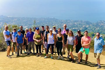 a group of people on a los angeles tour in santa monica