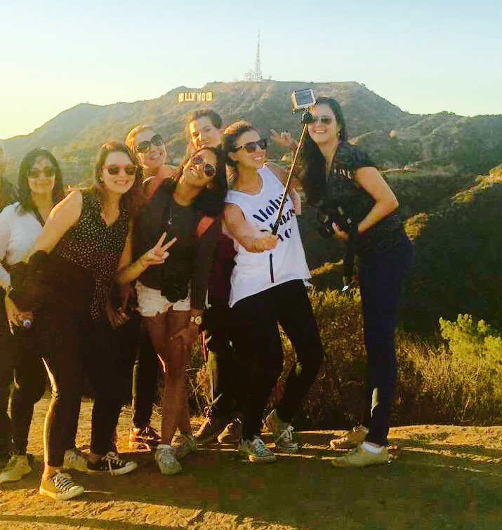 group hiking hollywood sign