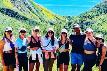 a group of people posing for a photo on an la hike tour