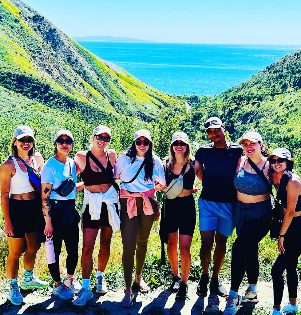 a group of people posing for a photo on an la hike tour
