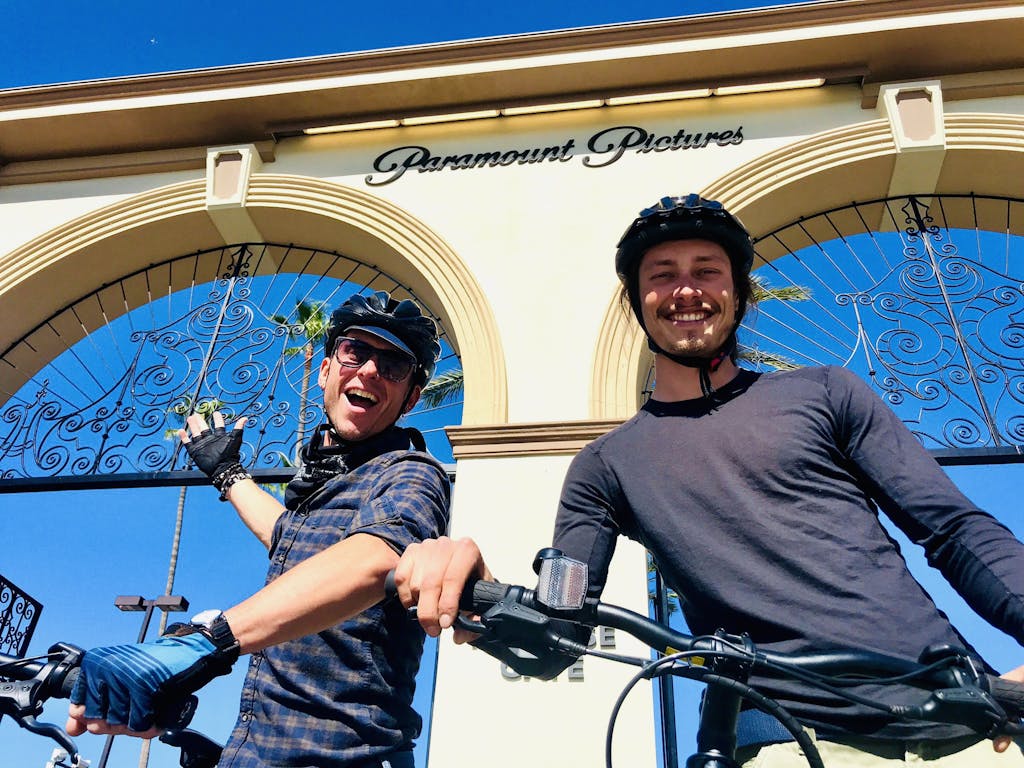 two people outside of paramount studios on a hollywood city tour