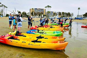 a group of people learning to kayak on an la team building tour