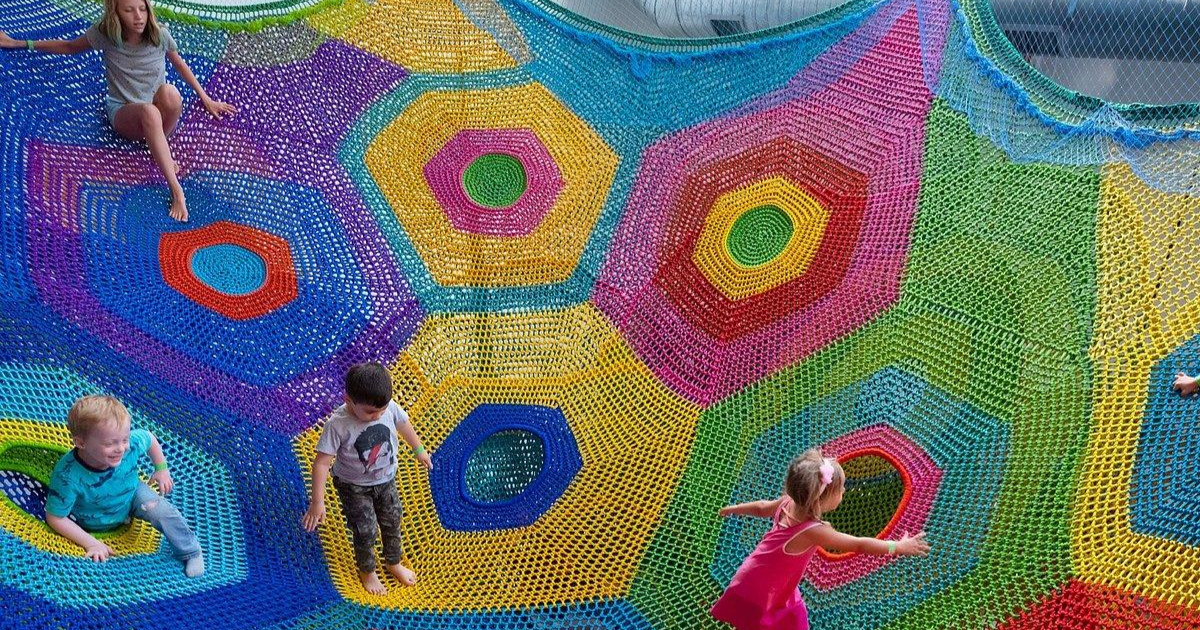 children playing on museum feature