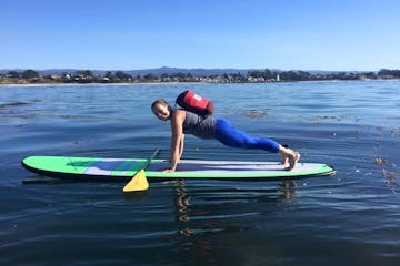 paddleboarder doing a pushup