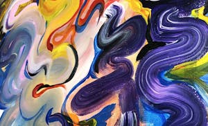 a close up of swirls of colors painted on a canvas