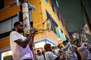 new orleans musicians playing the trumpet