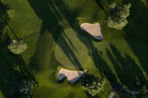 aerial view of a lush, green golf course
