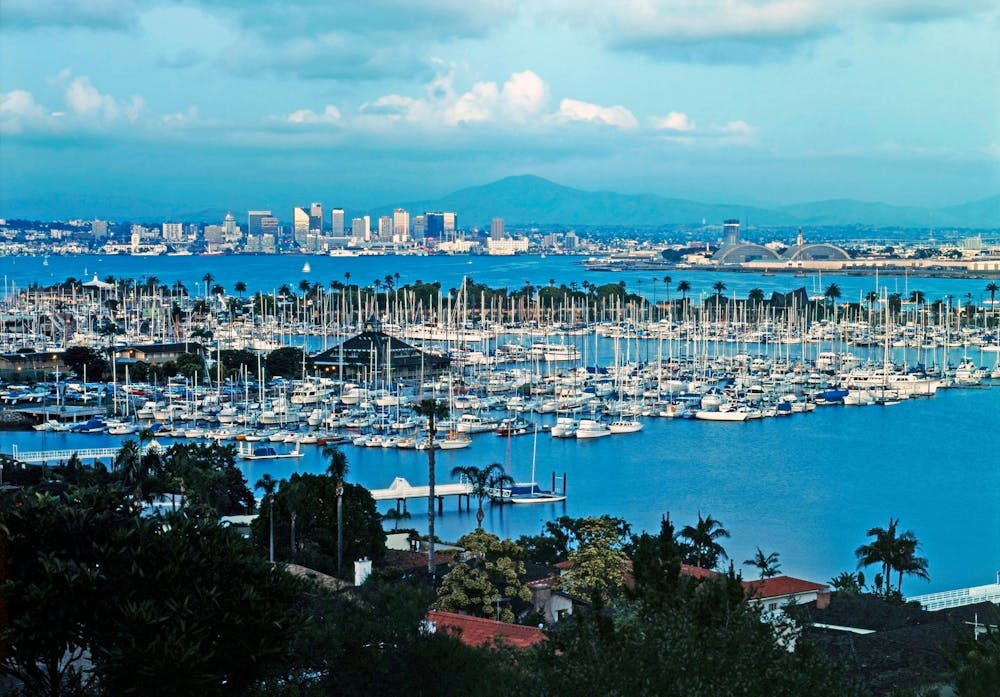 a view of a large body of water with a city in the background