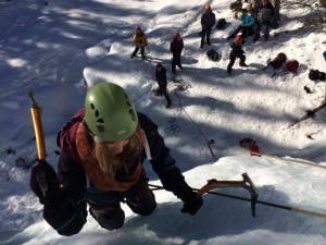 Group of people ice climbing in Canda