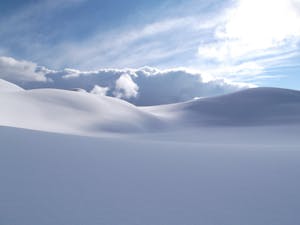 Gentle hills covered in snow