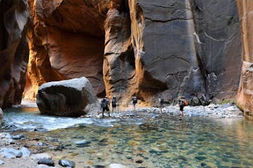 Guests participate in an adventure on the Guided Hike of Zion's Hidden Gems to explore the beauty of the Zion Canyons