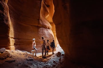 People standing in a Zion slot canyon