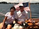 Sail Selina II Saint Michaels Maryland Chesapeake Sailing tours boat trips guests taking a turn at the wheel