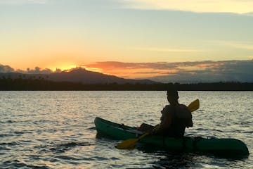 Kayaker viewing at the sunset on the Grande Laguna
