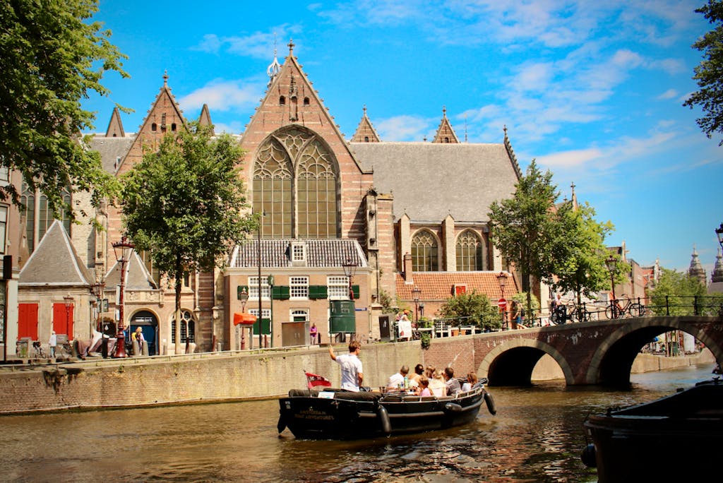 a church with a boat in the water