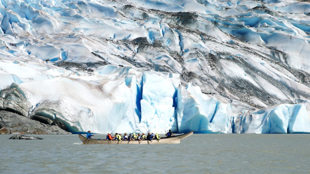 Paddling a Canoe in front of the Mendenhall Glacier