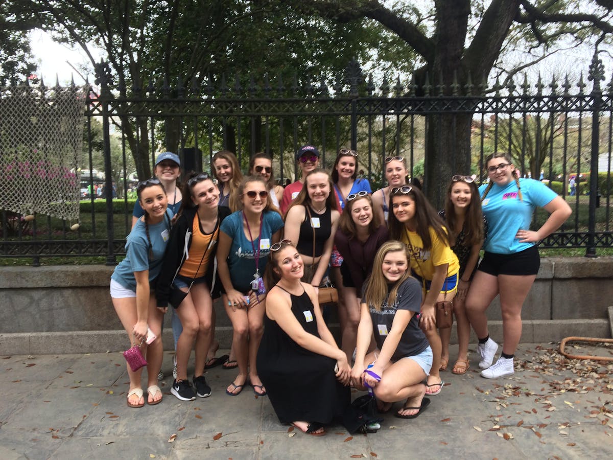 A group of cheerleaders that toured with Two Chicks Walking Tours in the New Orleans Metro area