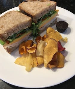 a sandwich cut in half on a plate