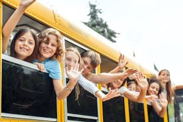 a group of people in a school bus