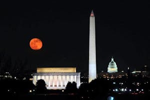 A full red moon over the Nation's monuments