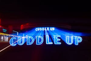 Cuddle Up Neon Sign Zoomed