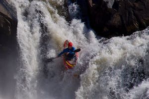 Kayaker navigating the rapids on the Potomac River at Great Falls, VA