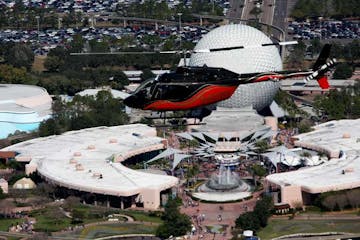 helicopter flying over disney