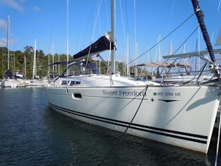 Front view of Sweet Freedom sailboat while docked