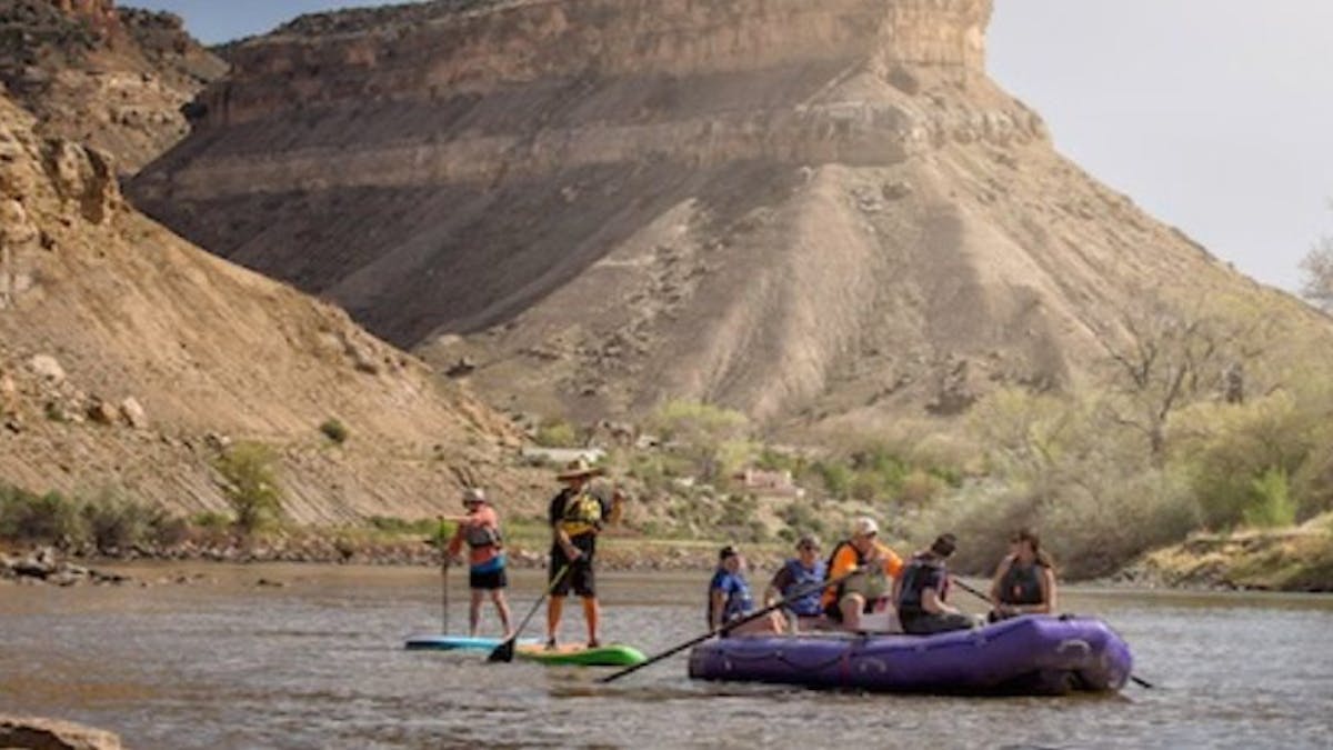 River rafters and paddle boarders on the Colorado