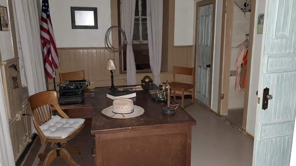 a room filled with furniture and a sink