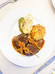 a plate of food with stew