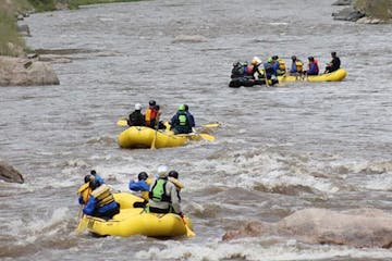 Three rafts on small rapids