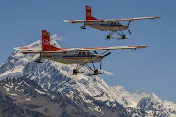 2 ski planes flying over Mt Cook in New Zealand